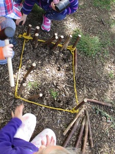 Using tools:  Mallet and wooden pegs